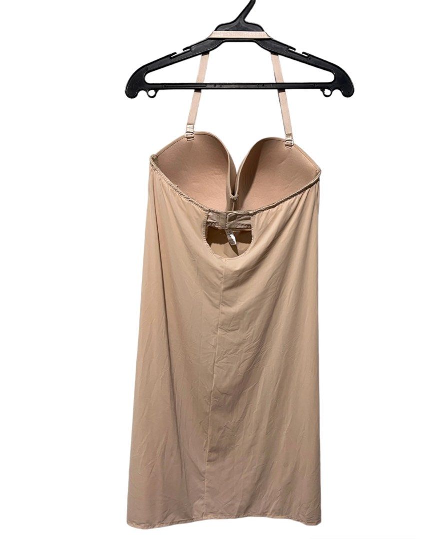 Dress with built outlet in push up bra