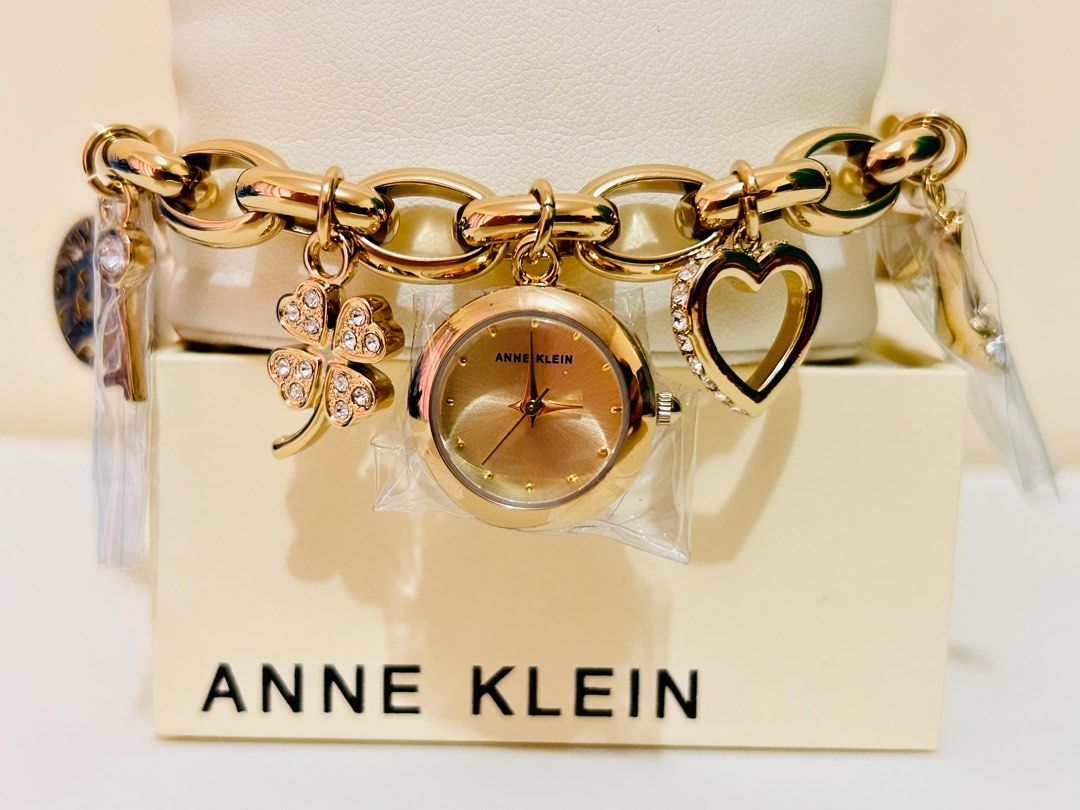  Anne Klein Women's Premium Crystal Accented Gold-Tone Charm  Bracelet Watch, 10/7604CHRM : Clothing, Shoes & Jewelry