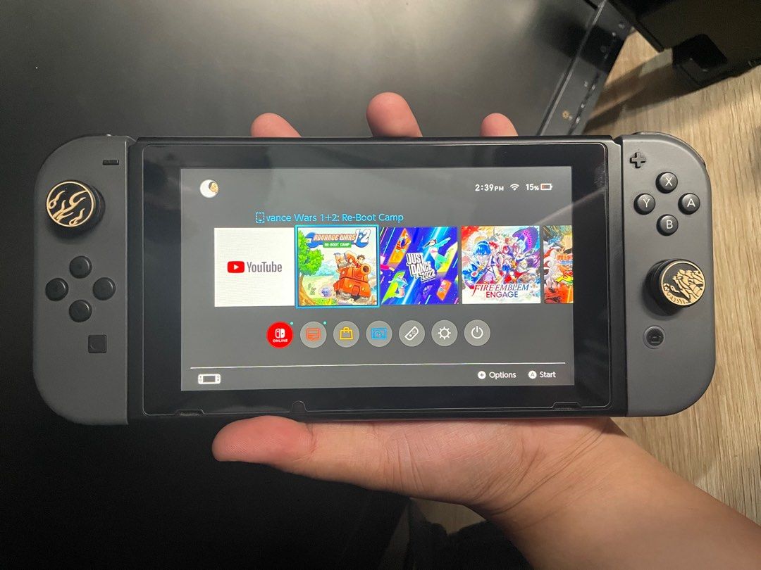 Nintendo Switch V2 (Category: Nintendo) located in Taguig. Submitted by bryanc146 (Listing ID 1247648547, Image 3). Description: FOR SALE: Nintendo Switch V2 (SD Card and Games Included) Comes with Sandisk Ultra Micro SD Card (256GB)(1500 PHP) Games Included (Purchased Online) (Around 7000 PHP): 1. Fire Emblem Engage (59.99 USD) 2. Just Dance 2022 (Subscribed to Just Dance Unlimited until 11 Nov 2023) (37.49 USD) 3. Mortal Kombat 11 (9.99 USD) 4.