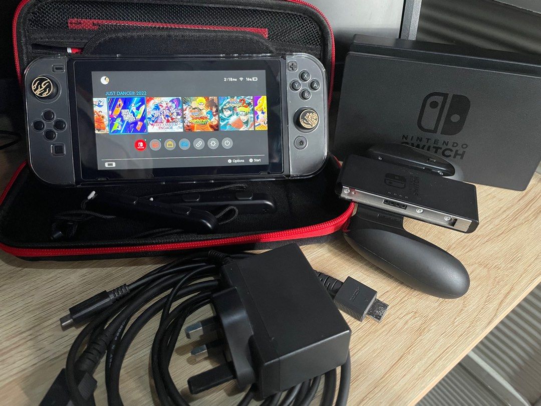 Nintendo Switch V2 (Category: Nintendo) located in Taguig. Submitted by bryanc146 (Listing ID 1247648547, Image 2). Description: FOR SALE: Nintendo Switch V2 (SD Card and Games Included) Comes with Sandisk Ultra Micro SD Card (256GB)(1500 PHP) Games Included (Purchased Online) (Around 7000 PHP): 1. Fire Emblem Engage (59.99 USD) 2. Just Dance 2022 (Subscribed to Just Dance Unlimited until 11 Nov 2023) (37.49 USD) 3. Mortal Kombat 11 (9.99 USD) 4.