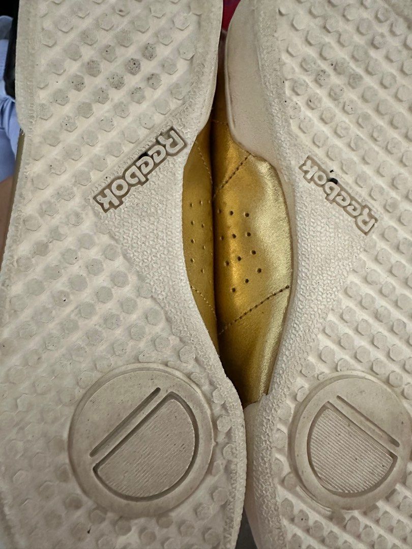 Reebok new arrivals gold sneakers