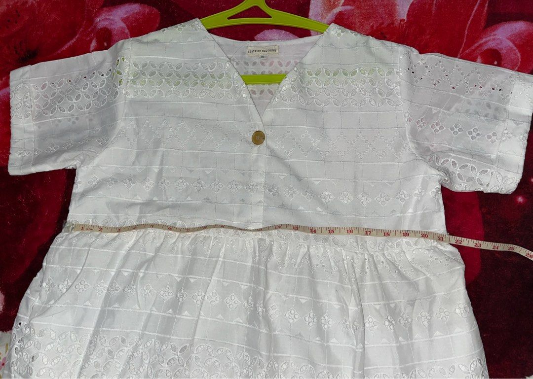 White Eyelet Midi Dress XL (Category: Dresses) located in Agoncillo. Submitted by JA_Fam (Listing ID 1247686397, Image 2). Description: Brand New Eyelet Midi Dress Washed but never worn It has pocket on both sides. :) Good quality, has white lining inside I bought it in Indonesia when I was pregnant but I was not avail to use it. Size: waist area is 21 1/2 inches flat lay Length: 41inches RFS: too big for me MOP: Gcash, BDO .
