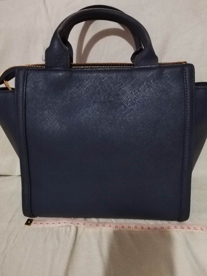 BLACK by Martin Sitbon sling/handbag (Category: Luxury Bags & Wallets) located in Quezon City. Submitted by girlanne02 (Listing ID 1247834902, Image 3). Description: Black by Martin Sitbon office/casual bag navy blue in color sling strap red leather clean canvass inside sling bag hand bag no tarnish no sira in any part very good condition rfs: need extra cash.