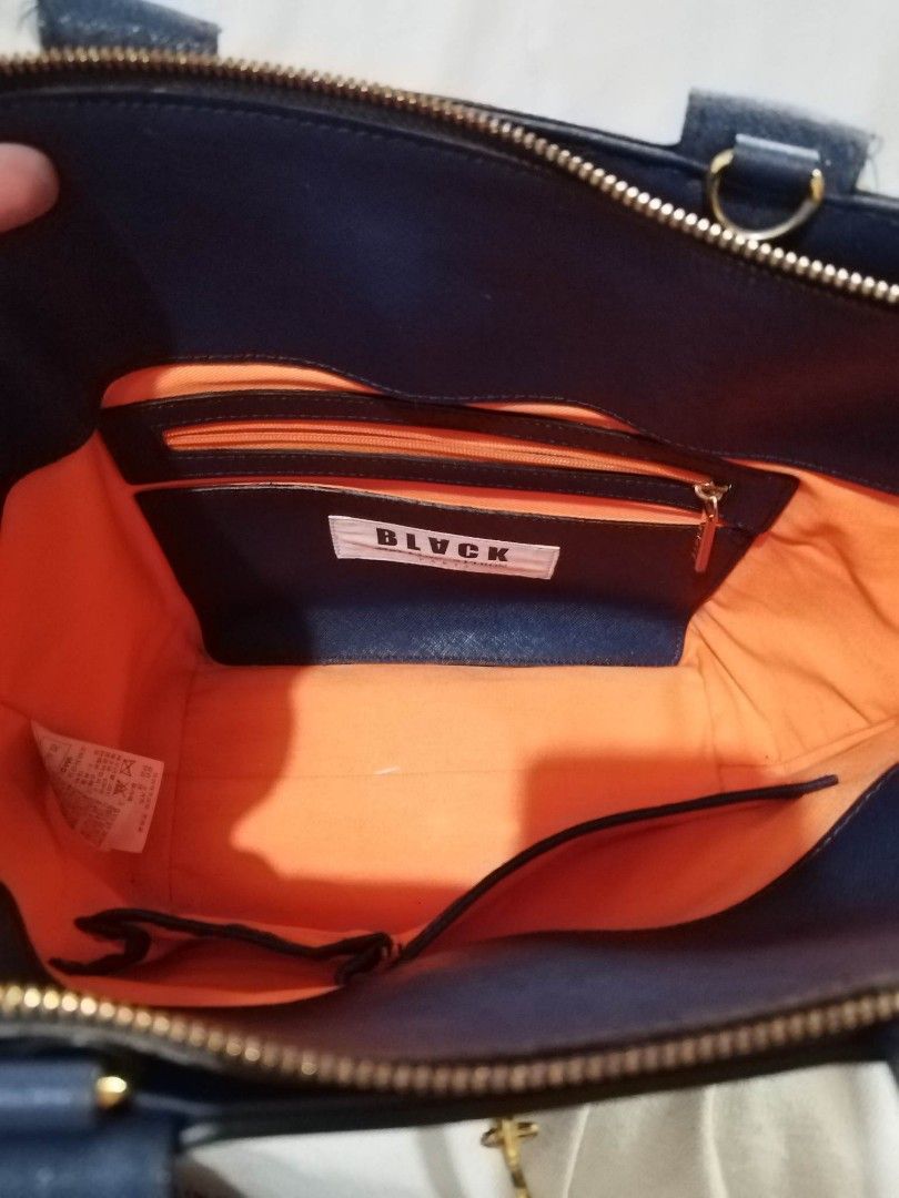 BLACK by Martin Sitbon sling/handbag (Category: Luxury Bags & Wallets) located in Quezon City. Submitted by girlanne02 (Listing ID 1247834902, Image 2). Description: Black by Martin Sitbon office/casual bag navy blue in color sling strap red leather clean canvass inside sling bag hand bag no tarnish no sira in any part very good condition rfs: need extra cash.