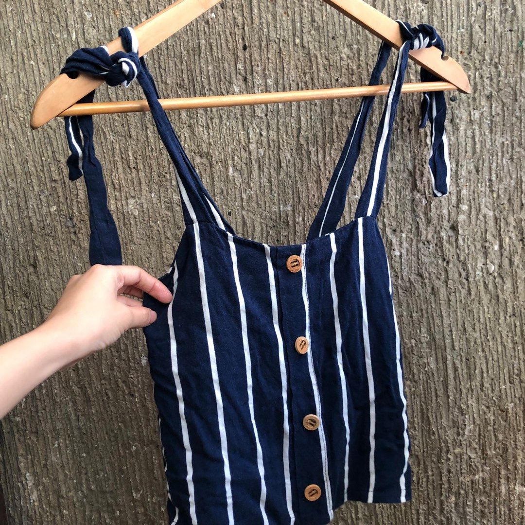 blue pinstripe self tie sleeveless top (Category: Sleeveless) located in Taguig. Submitted by unfeigned (Listing ID 1247863246, Image 3). Description: price is firm^^ best fits xs - petite/semi s has very soft fabric.