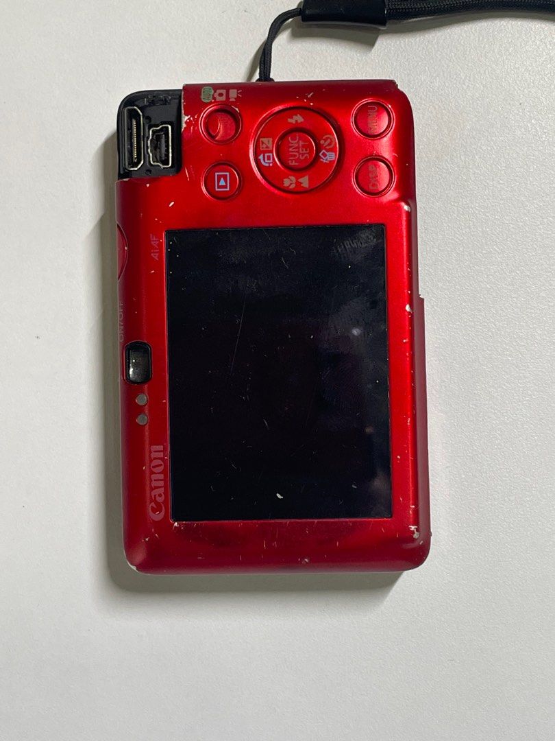 Canon Ixus 100 IS digital camera (digicam) Red (Category: Cameras) located in Quezon City. Submitted by 063005 (Listing ID 1247783872, Image 2). Description: Unit only Does not turn on anymore because battery door fell off Selling for parts.
