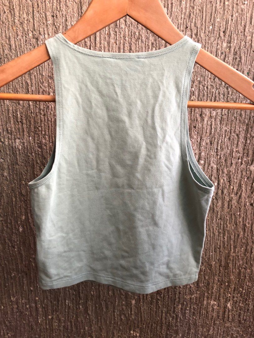 forever 21 sage green sleeveless top (Category: Sleeveless) located in Taguig. Submitted by unfeigned (Listing ID 1247862076, Image 3). Description: price is firm^^ has a very light discoloration in front (kindly refer to photos) .