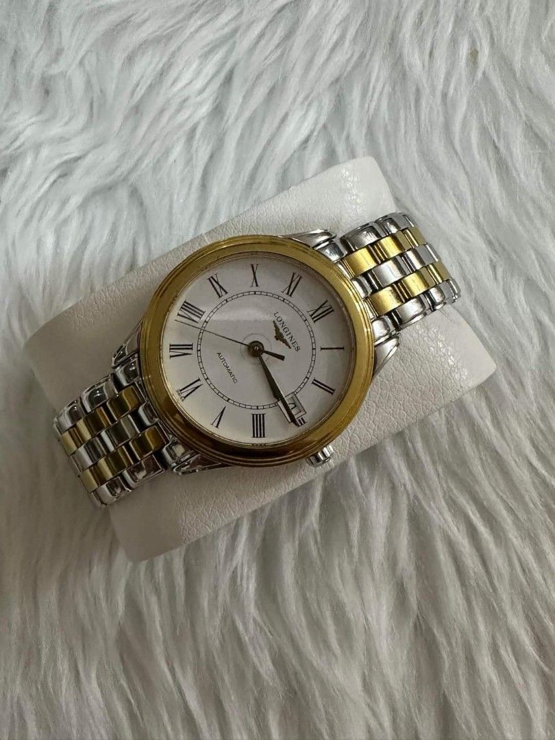 Longines Automatic Authentic almost new condition 37mm Sapphire Crystal White Roman numerals dial Gold plated bezel Gold plated steel bracelet Transparent case back Swiss made Complete links With box ...