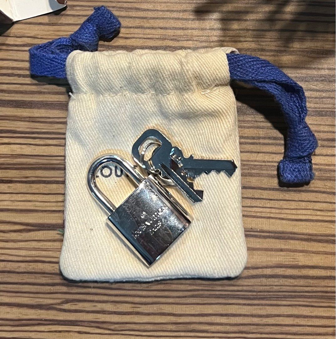 Louis Vuitton Silver Padlock, Luxury, Bags & Wallets on Carousell