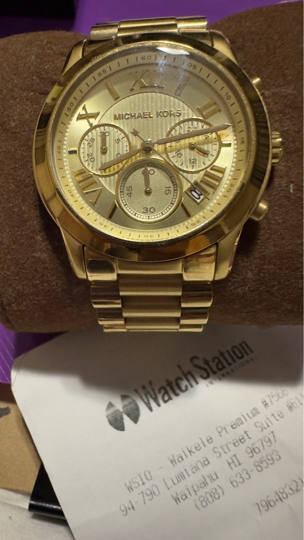 Mk top gold watch