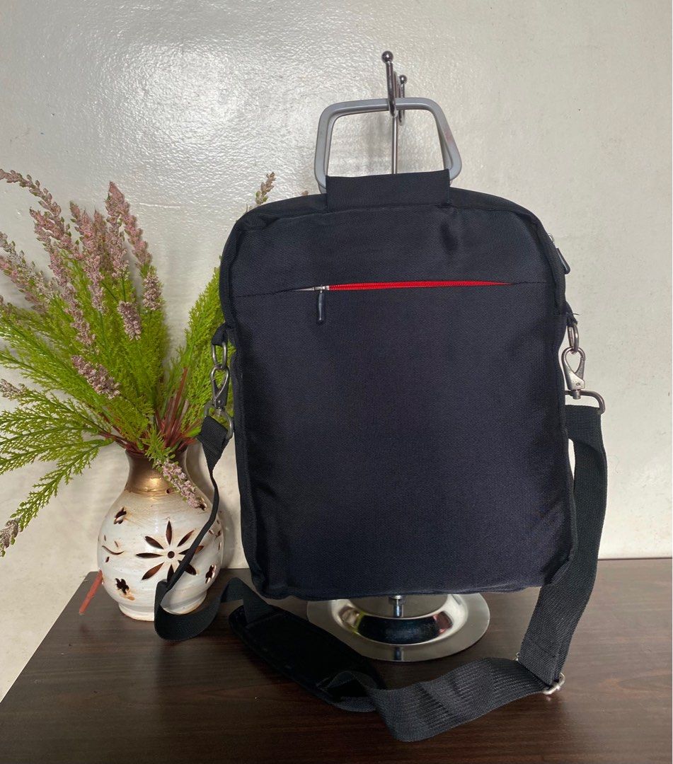 Netbook/ Document Sling Bag (Category: Laptop Bags & Sleeves) located in Legazpi City. Submitted by wearablefinds (Listing ID 1247792591, Image 2). Description: 10x15x3” Like new No flaws Zipper closure Canvas and nylon material With plenty of compartments Light weight Silver hardware Excellent quality Check photos for details .