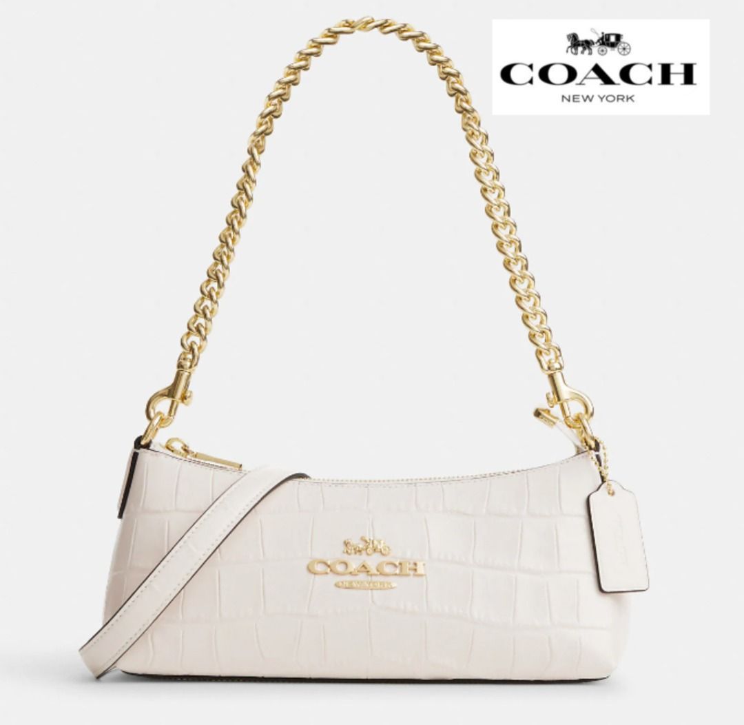 White and gold coach purse top