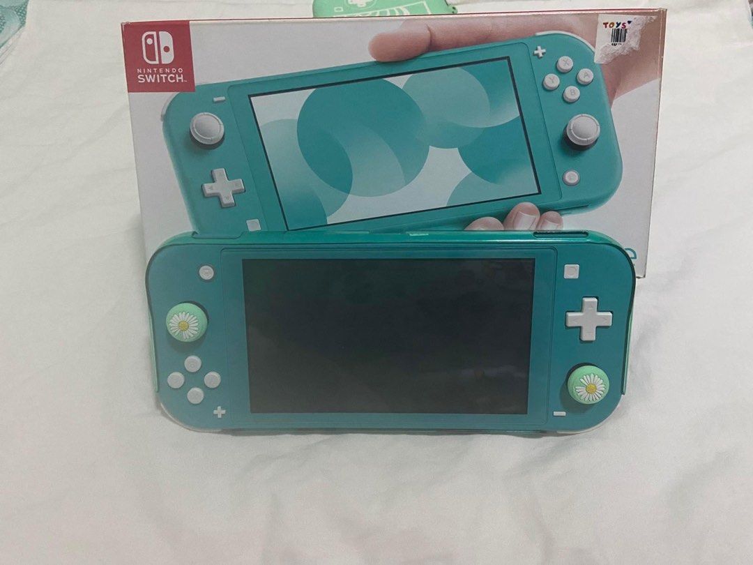 Nintendo Switch Lite (Category: Nintendo) located in Taguig. Submitted by johnhb (Listing ID 1247827940, Image 1). Description: For Sale: Nintendo Switch Lite for P7,000.00 (Negotiable) without games. The System is in pristine condition as the only game that we used it for is Animal Crossing and some mini games that could not put any strain on the analog sticks. Freebies: pokemon case controller animal crossing case bag animal crossing thumb grip