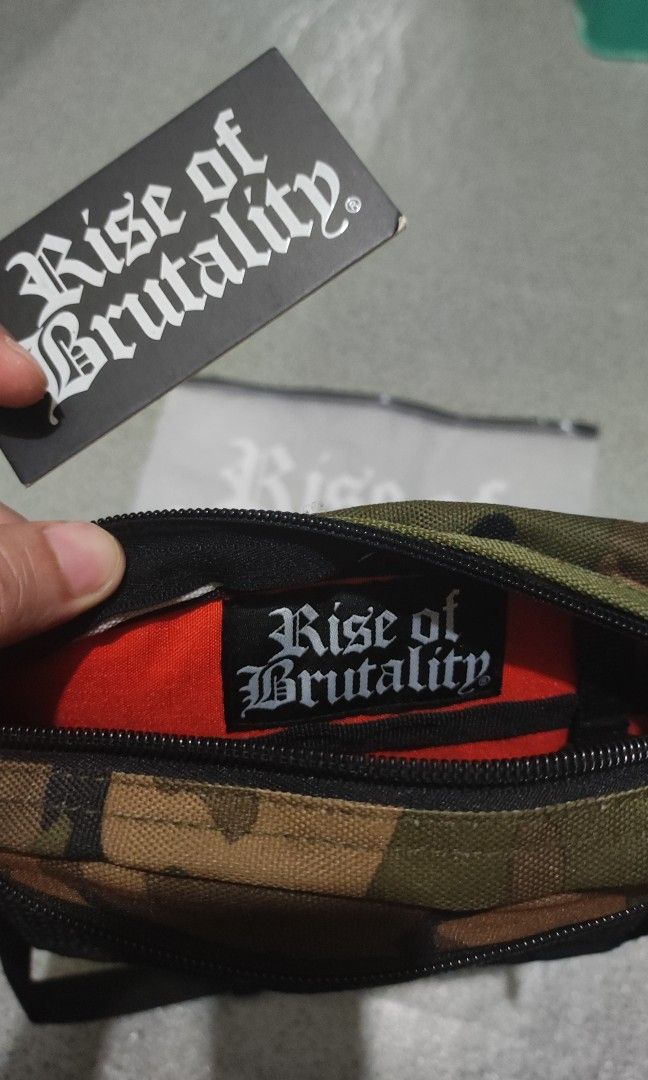 Rise of brutality (Category: Sling Bags) located in Caloocan City. Submitted by prelablcn (Listing ID 1247848031, Image 3). Description: Rise of brutality sling bag Used once See pics for details.