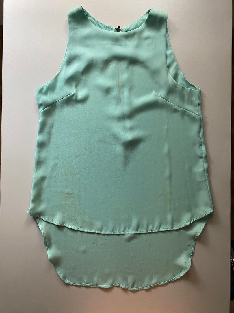 Shopaholic Sleeveless Teal Top (Category: Sleeveless) located in Rizal. Submitted by sann13 (Listing ID 1247840451, Image 2). Description: - For ₱175 only! - Size: S - Perfect for: Casual galas, formal events, dinner dates, etc. - Issues: Small stains - RFS: Decluttering - MOP: GCash only - Shipping: Lalamove or J&T.
