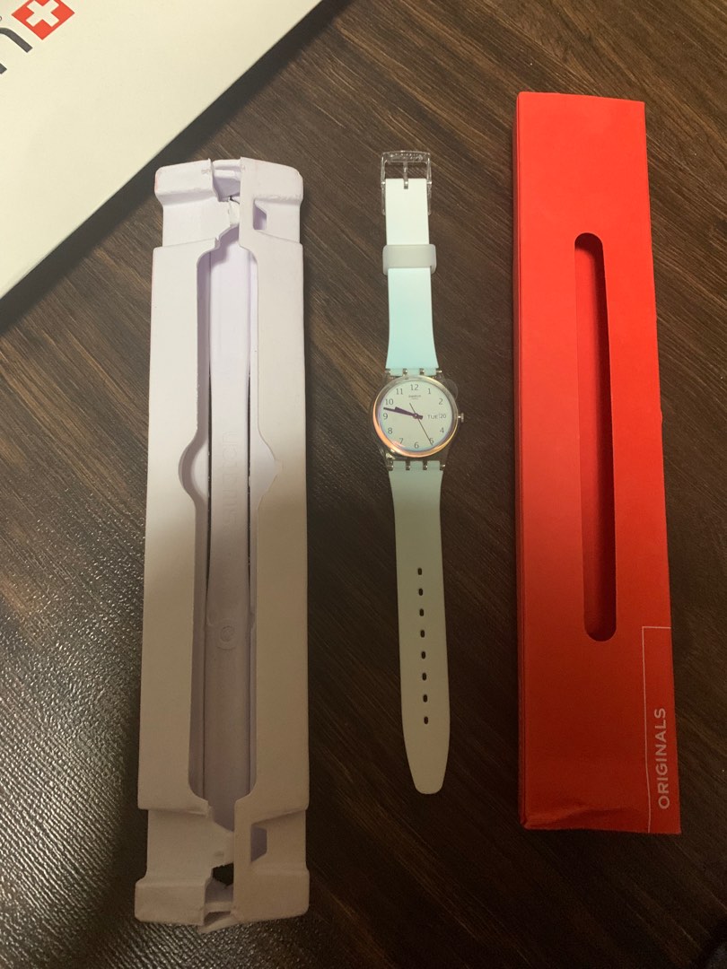 Swatch light blue watch Luxury Watches on Carousell