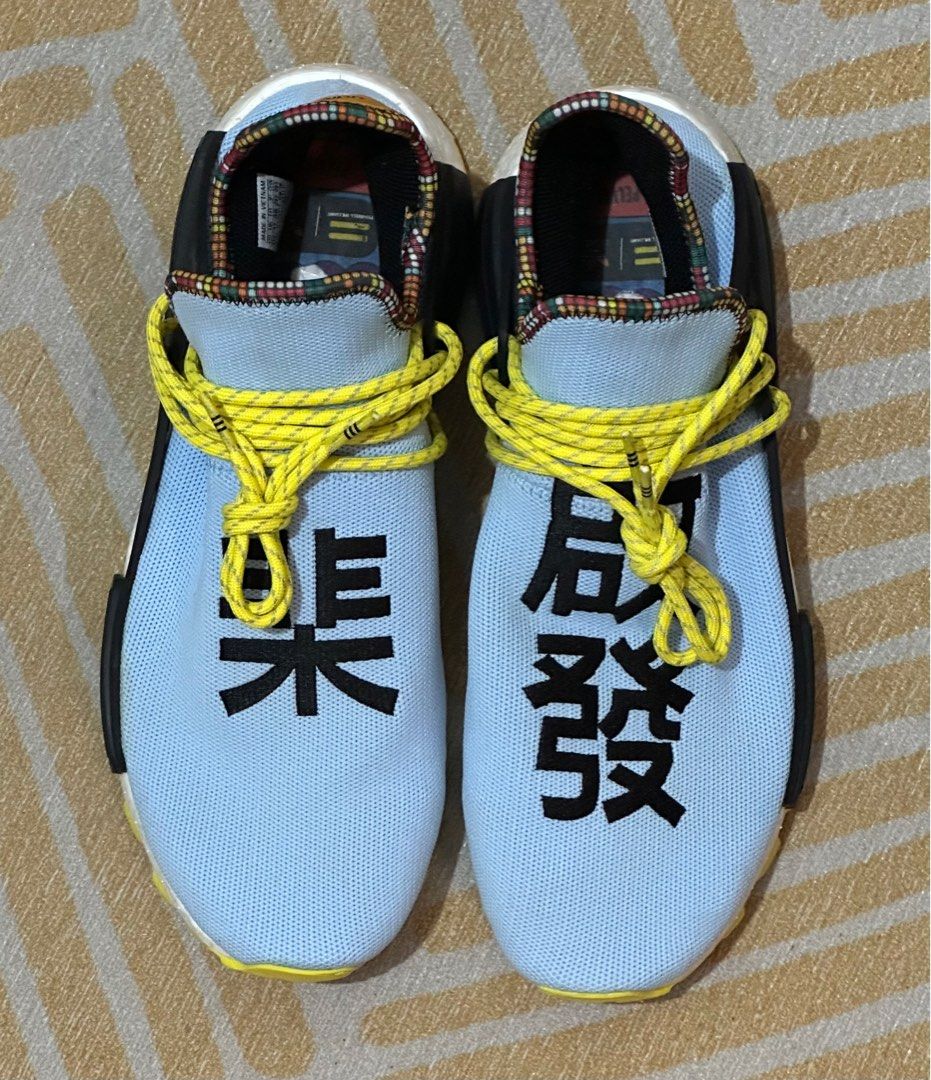 Light blue human race top