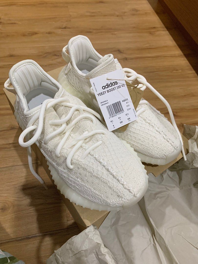 Yeezy triple hotsell white resale