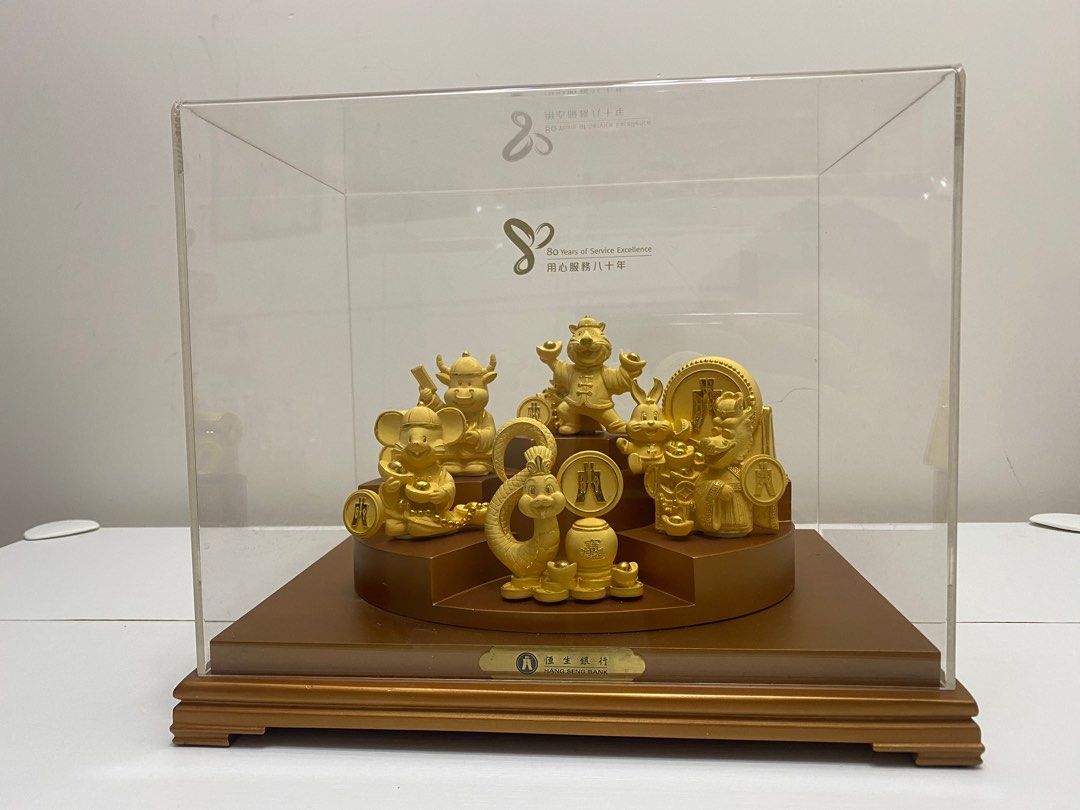 執屋清貨恒生銀行Hang Seng Bank 80週年12生肖鼠牛虎兔龍蛇金擺設, 傢俬＆家居, 家居裝飾, 家居裝飾- 其他- Carousell