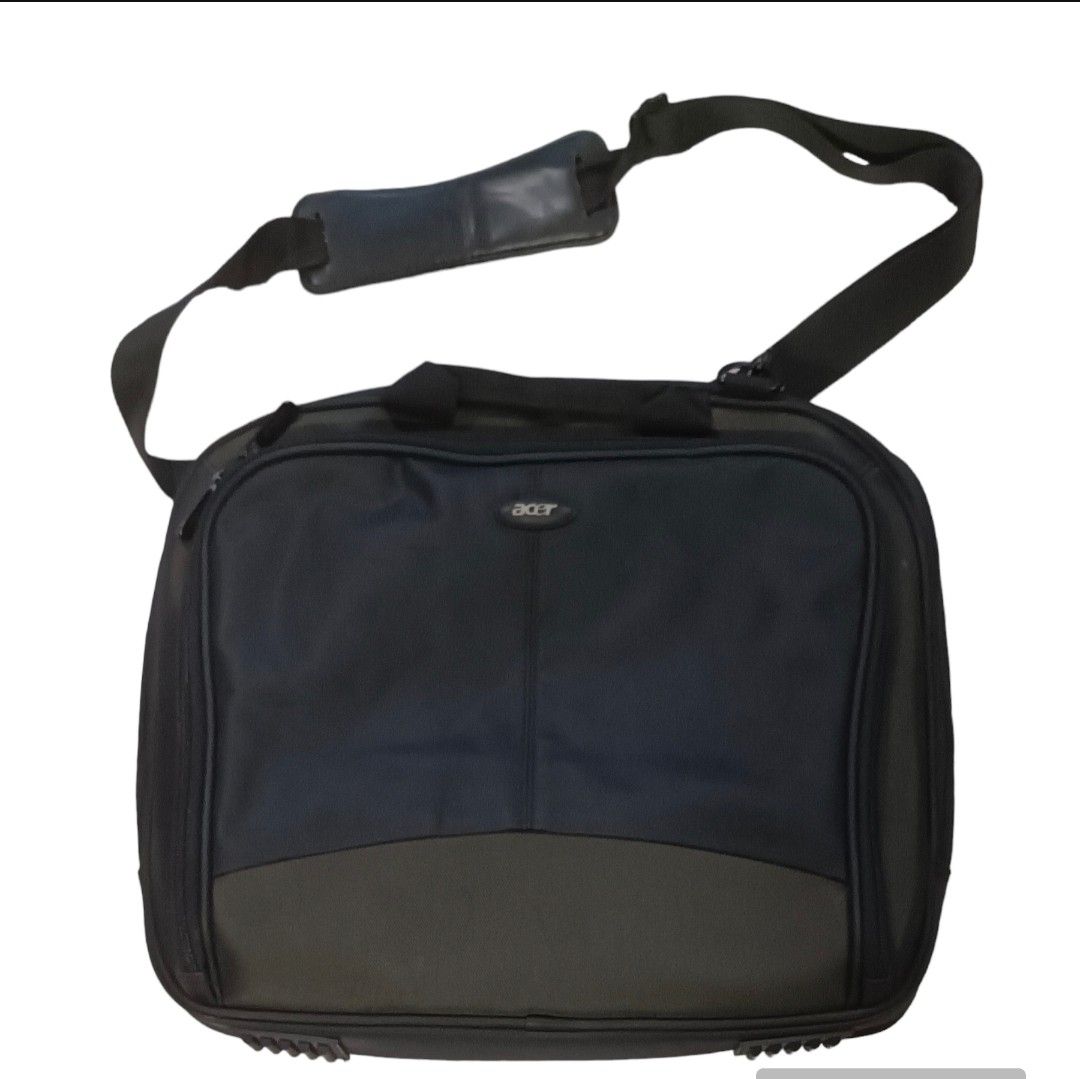 Acer Laptop Bag (Category: Laptop Bags & Sleeves) located in Makati City. Submitted by inxsstuff (Listing ID 1248004008, Image 1). Description: In good condition; never used. Two-tone - black and army green Ideal for 14-inch laptop. 2 sleeves internal sleeves and 2 external pockets. With strap for trolley handle attachment. Payment thru Gcash or BPI..