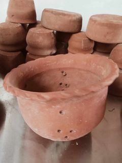 Clay pot for hanging plants