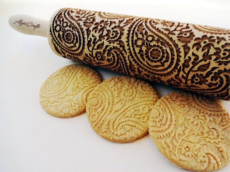 Embossed wood rolling pin from Lithuania (Category: Bakeware) located in Paranaque City. Submitted by paw_prints9 (Listing ID 1248044086, Image 1). Description: PAISLEY PATTERN by Algis Crafts, Lithuania Total length 15” Embossing part 7.5” Diameter 2.4” P1800 Made from high-quality beechwood Comes with recipes and care tips Ships from Parañaque .