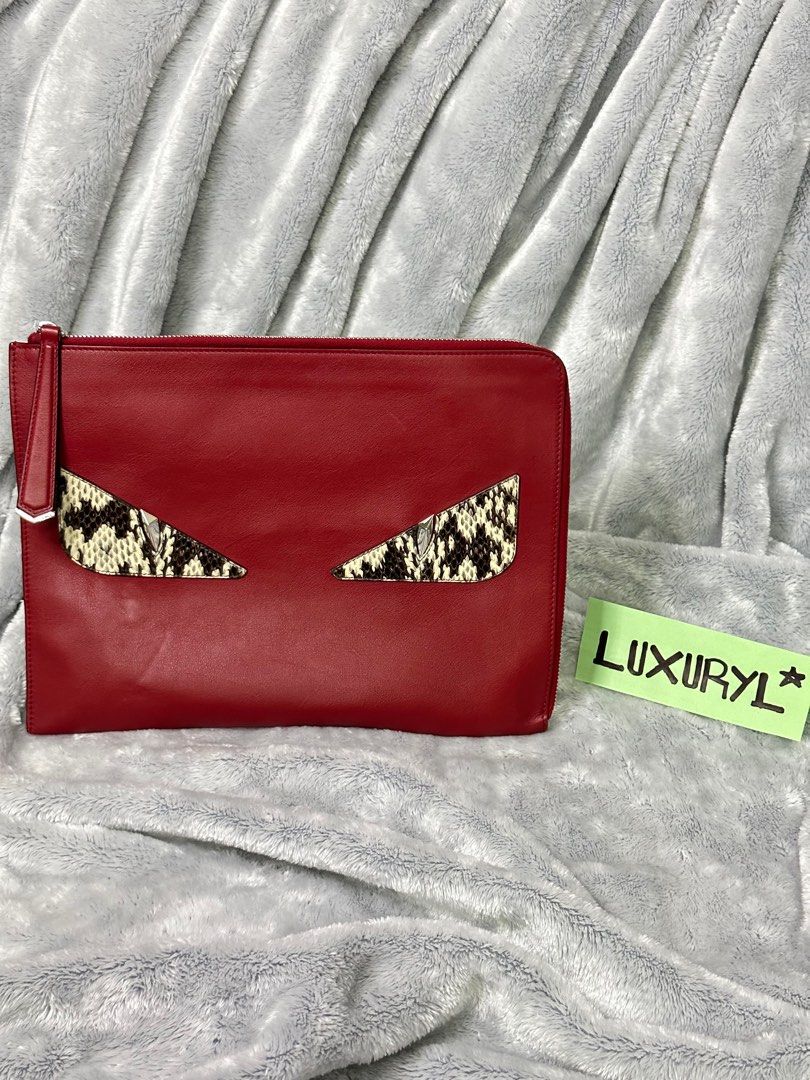 FENDI Red Monster Leather Clutch Bag (Category: Luxury Bags & Wallets) located in Dasmarinas. Submitted by luxuryl (Listing ID 1248087873, Image 1). Description: Authentic FENDI Red Monster Leather Clutch Bag. The monster clutch bag features a leather body and a top zip closure. Intact Tag/Heat Stamp Very Good Condition 9.8/10 📍We do meet up within Metro Manila/Cavite area.🤝 📍For other provinces we do shipping. 100% Original/Authentic Money ba