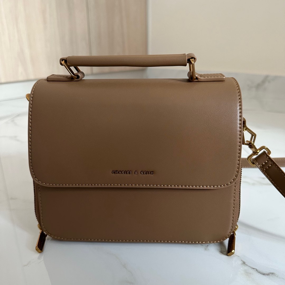 Front flap store top handle bag