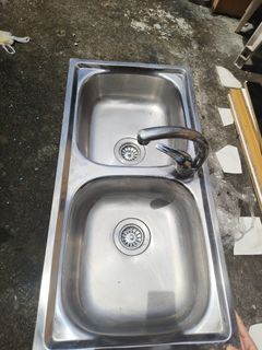 Kitchen Sink and Faucet Pull Out From Condo