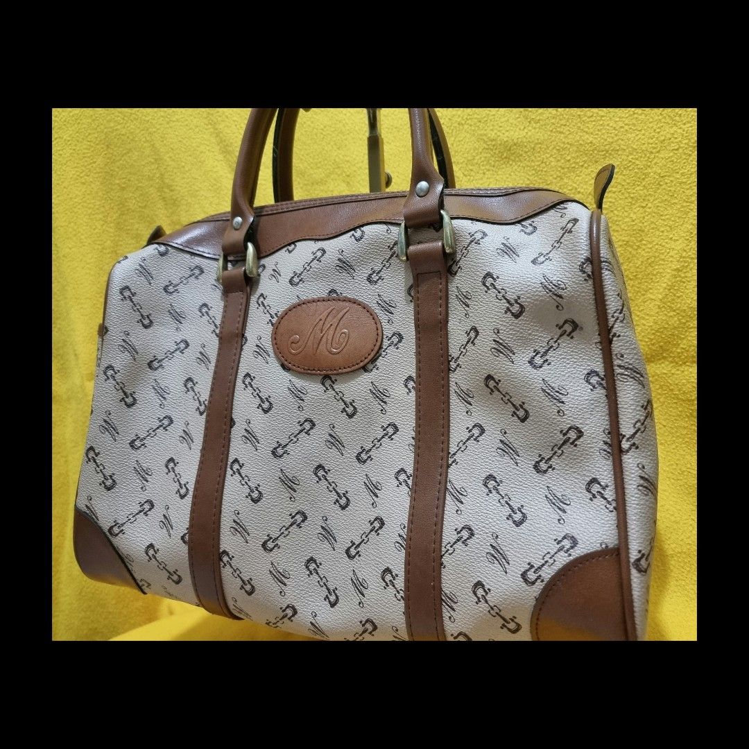 "M" Horsebit Monogram Boston Bag (Category: Luxury Bags & Wallets) located in Rizal. Submitted by roccini (Listing ID 1247998360, Image 3). Description: "M" in Horsebit Monogram Boston Bag -Like New and Excellent Condition -In Horsebit Monogram -Thick and Excellent Leather -No issues -Japan Auction Sourced -Hardwares in Golden Brass -With one side pocket. Main compartment has one side pocket -In YKK Zipper. No technical issues -Dimensiok is appro