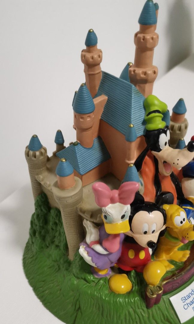 Standard Chartered Hong Kong Disneyland Savings Coin Bank featuring