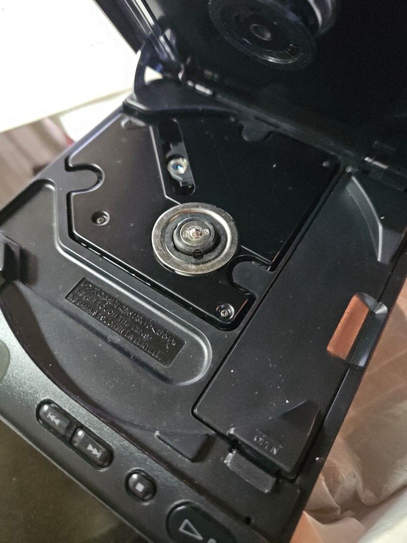 Vintage Sony Discman D-11 Compact CD Player (Category: Portable Music Players) located in Manila. Submitted by dreamcart (Listing ID 1247955202, Image 3). Description: Sony Discman D-11 Full inclusions. Has box, manual (in Japanese and English), cord, and the discman itself. Used by my mother in the 90s. Found it in the house. No idea if its working or not. It has battery compartments (4 AA batteries) and 9 volts charger (?). Item looks good in a