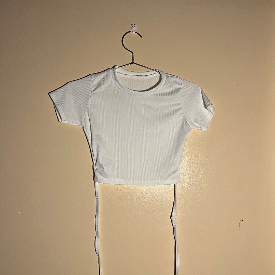 White criss cross top (Category: Blouses) located in Subic. Submitted by ri.declutter24 (Listing ID 1247940182, Image 1). Description: 🌻 Used but definitely not abused 💌 MOP : GCash & Maya only 📦 MOD : J&T 📍 Meet up : * Zambales Area * Near Mall of Asia or Aseana ( but date tba ).