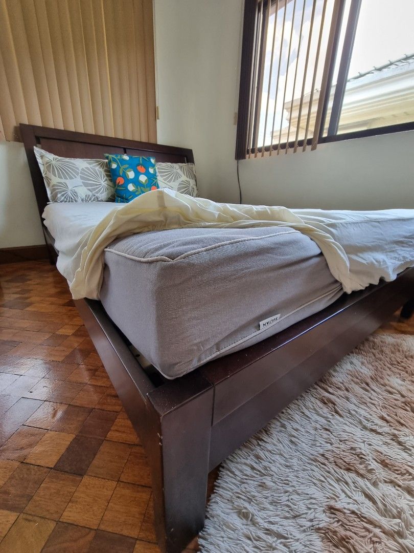 Wooden double bed frame and mattress on Carousell