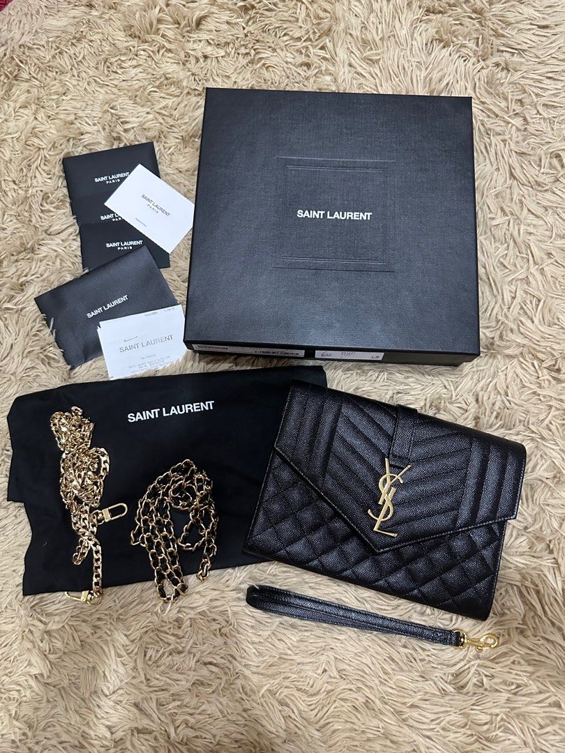YSL Wristlet - Envelope Pouch Embossed Leather (black) (Category: Luxury Bags & Wallets) located in Taguig. Submitted by aishops (Listing ID 1247926142, Image 2). Description: Guaranteed Authentic (bought in Australia Dustbag, cards, receipt included Free generic chain (black one in the photo) YSL Wristlet (Black) ENVELOPE FLAP POUCH IN MIX MATELASSÉ GRAIN DE POUDRE EMBOSSED LEATHER.