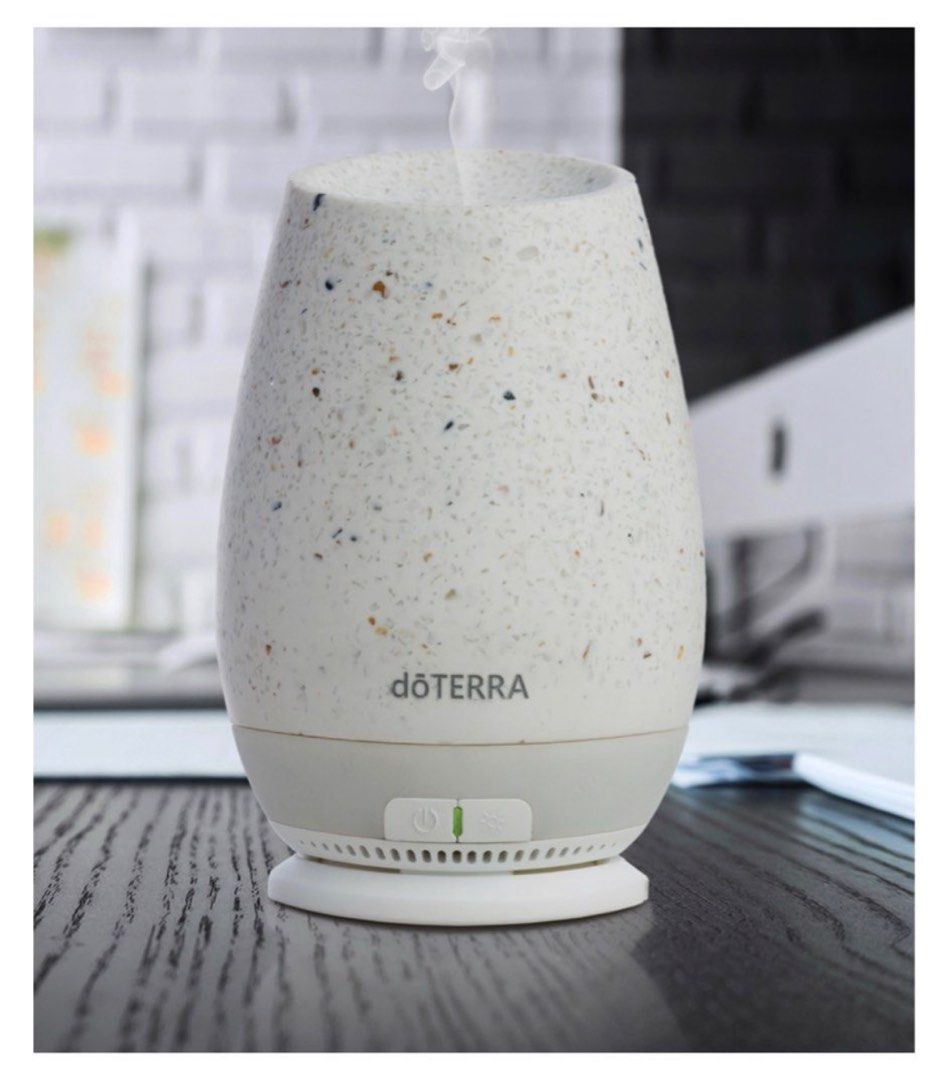 Doterra Diffuser Marble (Category: Home Fragrance) located in Singapore. Submitted by tsunai (Listing ID 1252286713, Image 1). Description: [Brand NEW][Authentic] Doterra Diffuser Marbel outlook. Opened and checked for condition .