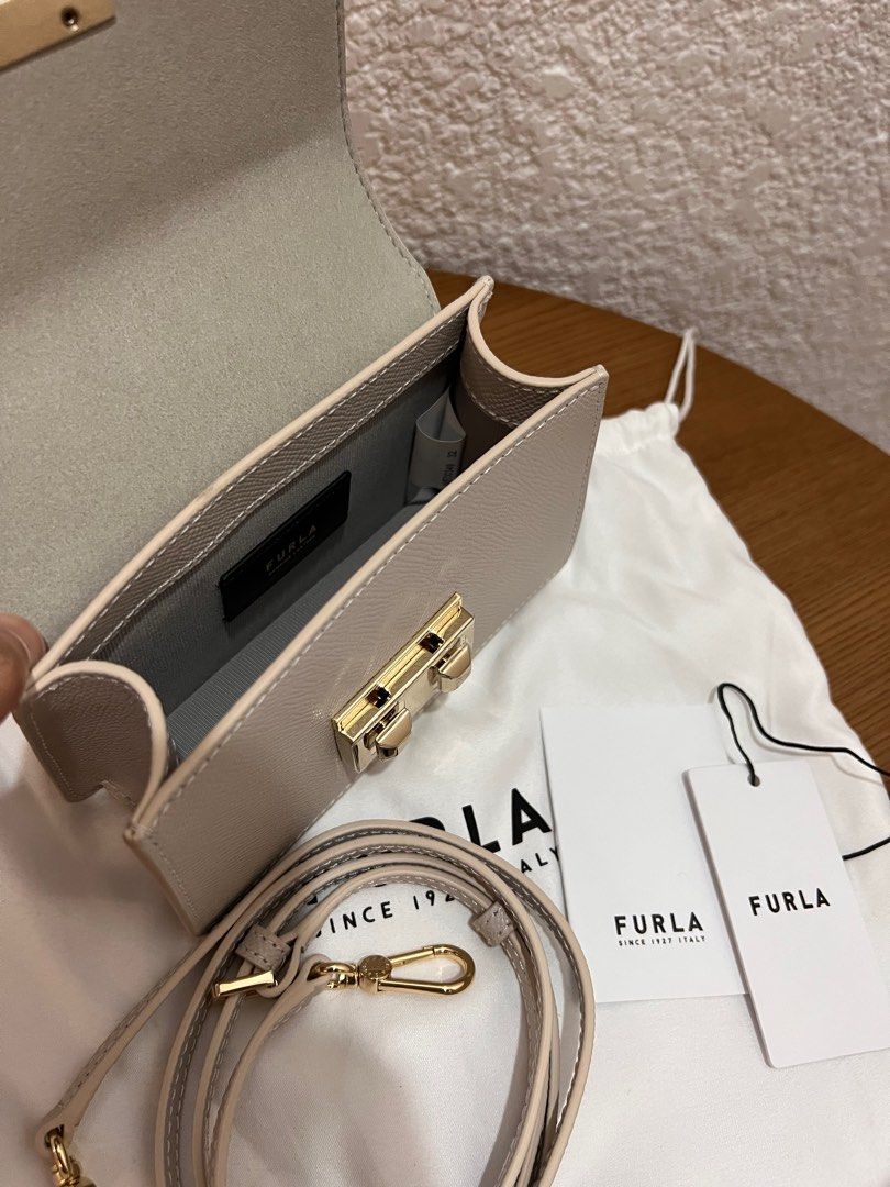 FURLA (Category: Luxury Bags & Wallets) located in Naga. Submitted by emteedee (Listing ID 1252332398, Image 3). Description: Furla Mini Bag with detachable strap Used once only complete inclusions with tags.