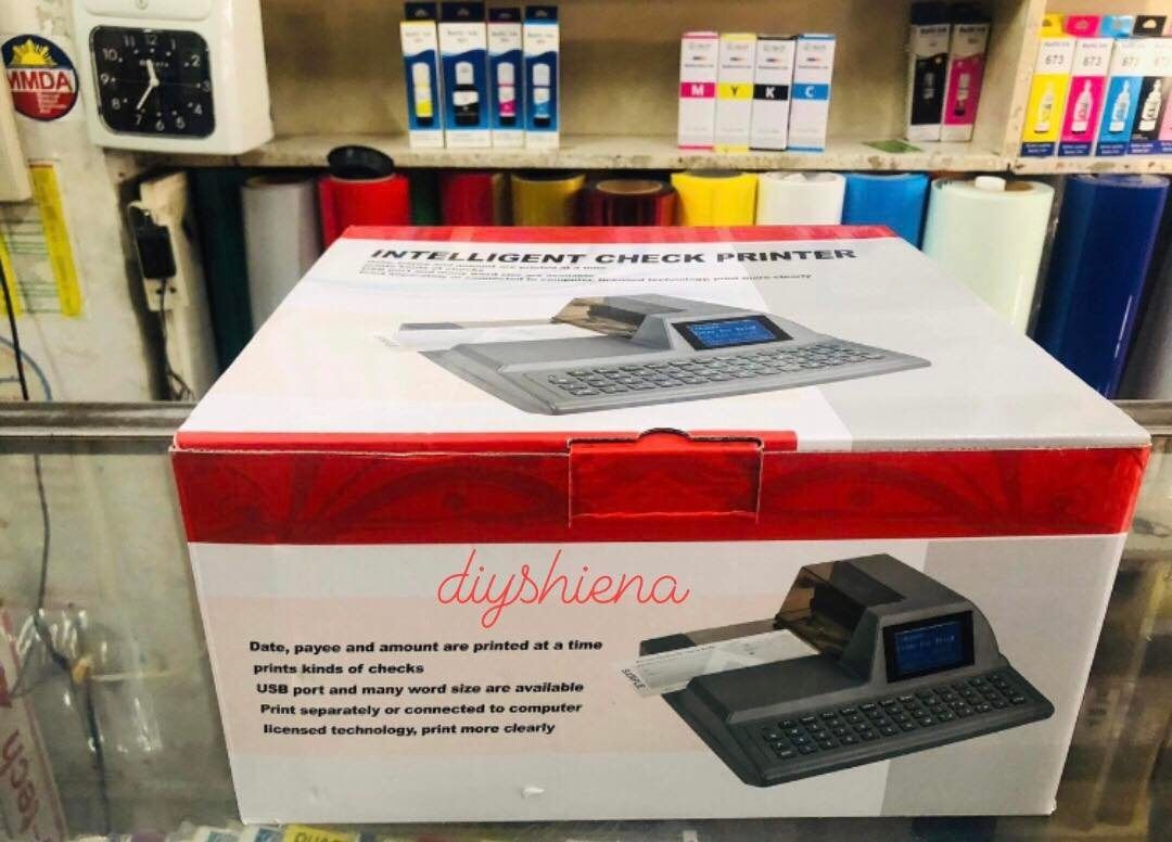 Intelligent Check Printer, Check Writer (Category: Printers, Scanners & Copiers) located in Manila. Submitted by diyshiena (Listing ID 1252239605, Image 1). Description: Intelligent Check Printer, Check Writer, ☑️Cheque Printer ☑️Thermal Ribbon ☑️1months service waranty To print whole cheque information 1 )Payee 2) Date 3) Amount in numbers 4 )Automatically amount in letters * Any Currency is available. * Any check size is workable. * Clear print