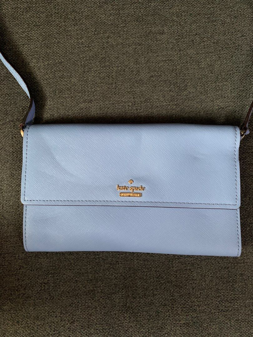 authentic kate spade sling wallet (Category: Luxury Bags & Wallets) located in Kawit. Submitted by aedeclutter (Listing ID 1252186667, Image 2). Description: ✅ authentic bought from US ✅ walang issue ✅ napakaganda.
