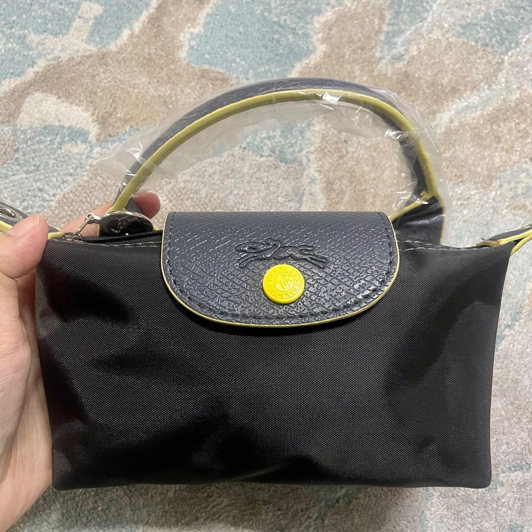 Longchamp Pouch with Handle & Sling (When Worn), Women's Fashion, Bags &  Wallets, Cross-body Bags on Carousell