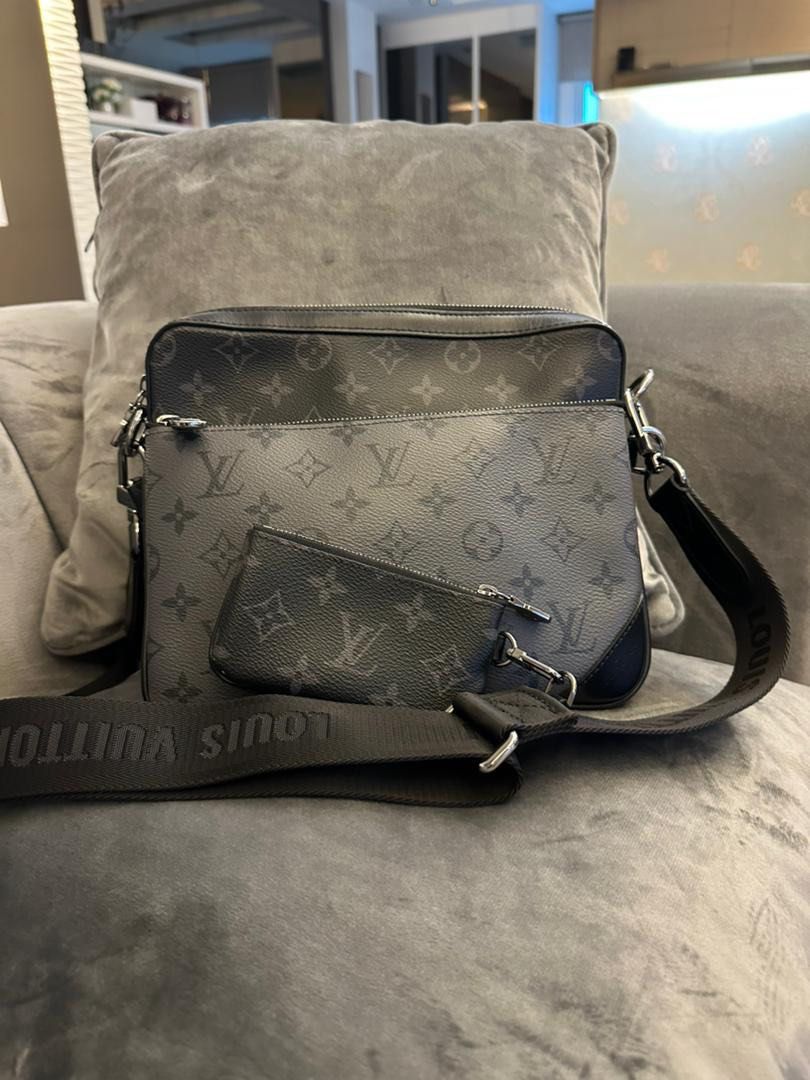 Trio messenger leather satchel Louis Vuitton Grey in Leather