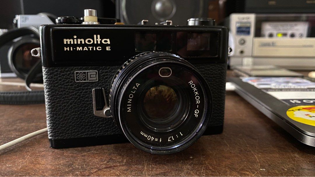 Minolta Hi-Matic E Black (Category: Cameras) located in Tabaco. Submitted by cinemahilig (Listing ID 1252188454, Image 1). Description: Good working condition. Lens has fungus na but film tested and sharp. With battery adapters for LR44 Item location: Tabaco City, Albay. 09395763344.