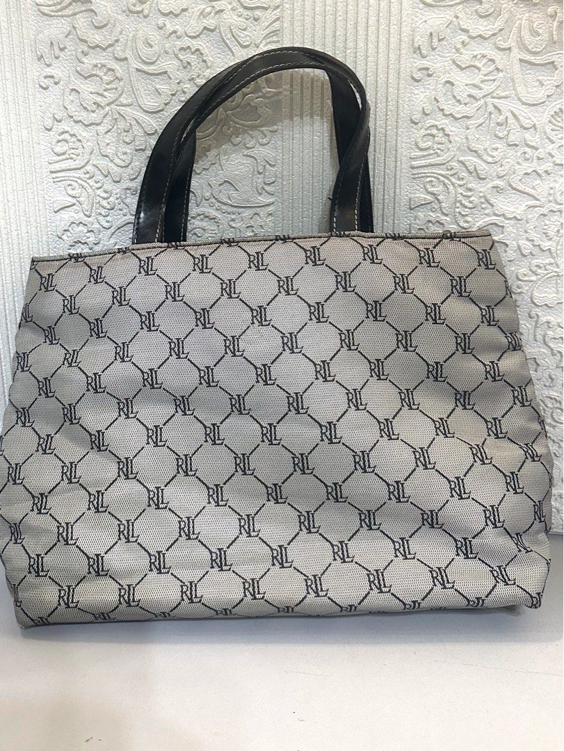 Ralph Lauren Nylon Mini Tote HandBag (Category: Luxury Bags & Wallets) located in Manila. Submitted by shopaholic_gurl (Listing ID 1252334968, Image 1). Description: Excellent condition Nylon monigram material Tri compartment With zipped compartment Autentic RL bag Fits tablet and basic essentials Sold as is.
