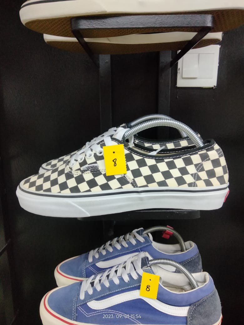 Checkered vans hot sale yellow stripe