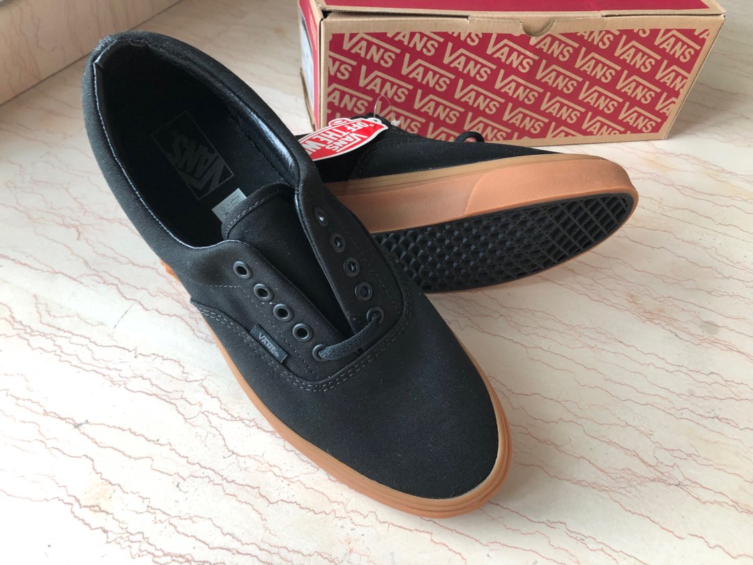 Vans era black shop gum on feet