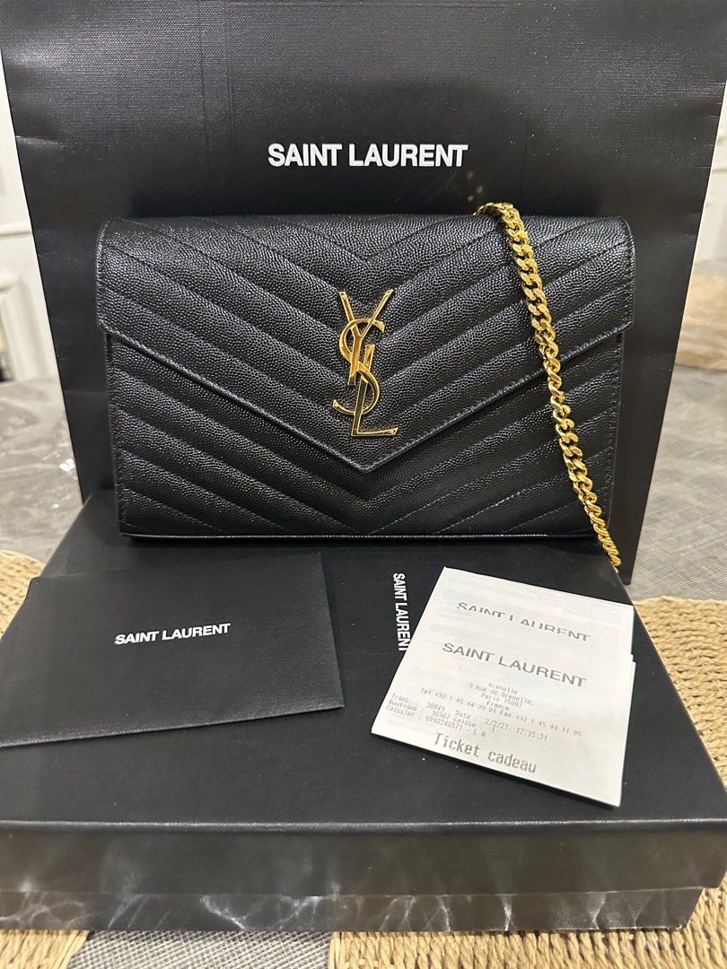 Markdown YSL large WOC like NEW condition