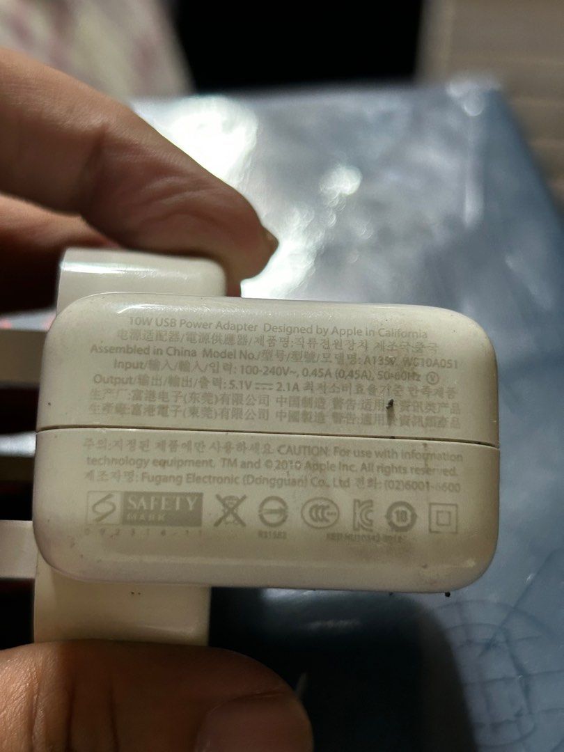 Apple 10w power adaptor (Category: Cables & Adaptors) located in Manila. Submitted by preowneddesigner (Listing ID 1254006875, Image 3). Description: Still in good condition Has been in storage for 3 years during the pandemic Used for iPad .
