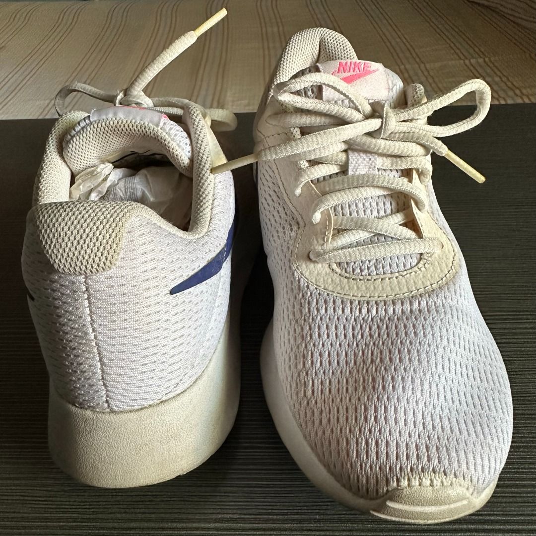 AUTHENTIC Nike Sneakers 24.5cm (Category: Sneakers) located in Quezon City. Submitted by ccsonceloveditems (Listing ID 1253977401, Image 2). Description: AUTHENTIC Nike Sneakers Unisex White with blue swoosh 24.5cm No box MOP: Gcash BPI.