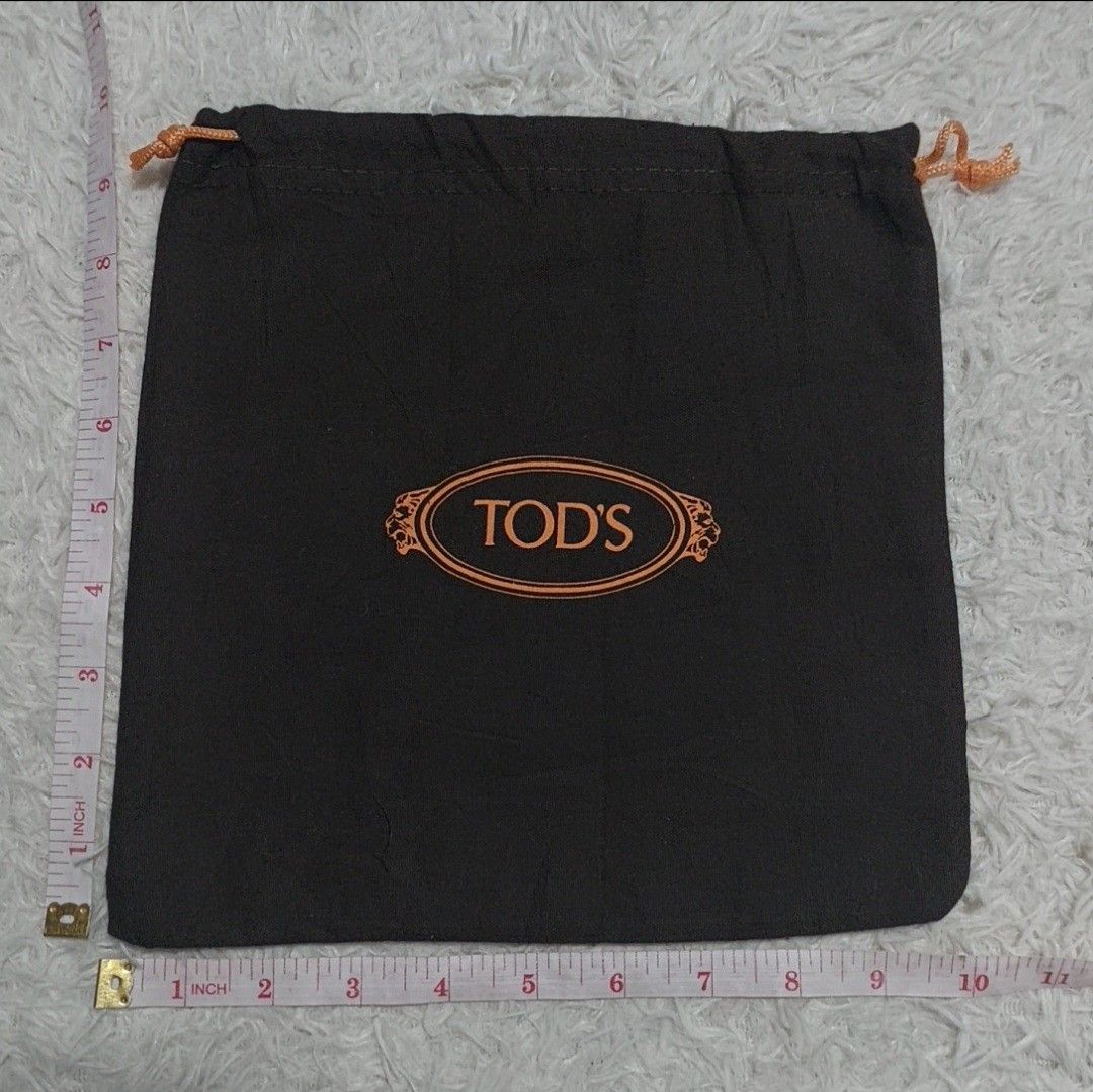 Authentic Tods Dust bag 10x10 inches (Category: Luxury Bags & Wallets) located in Manila. Submitted by jfluxury.co (Listing ID 1254050747, Image 2). Description: excellent condition no flaws bought in Japan 🇯🇵 💯% Authentic. 😊 Money back guarantee. 😊 Clean and ready to use na po.