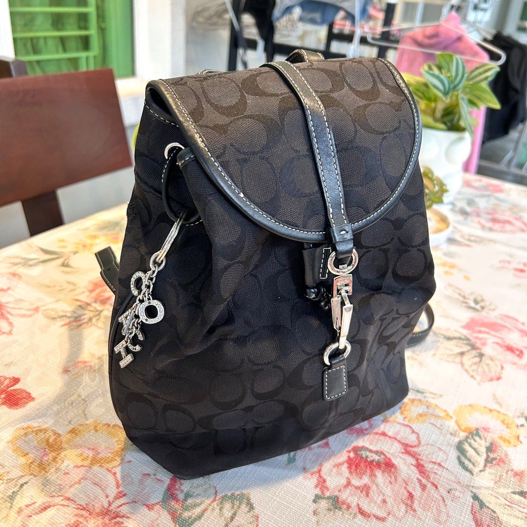 Coach black backpack discount purse